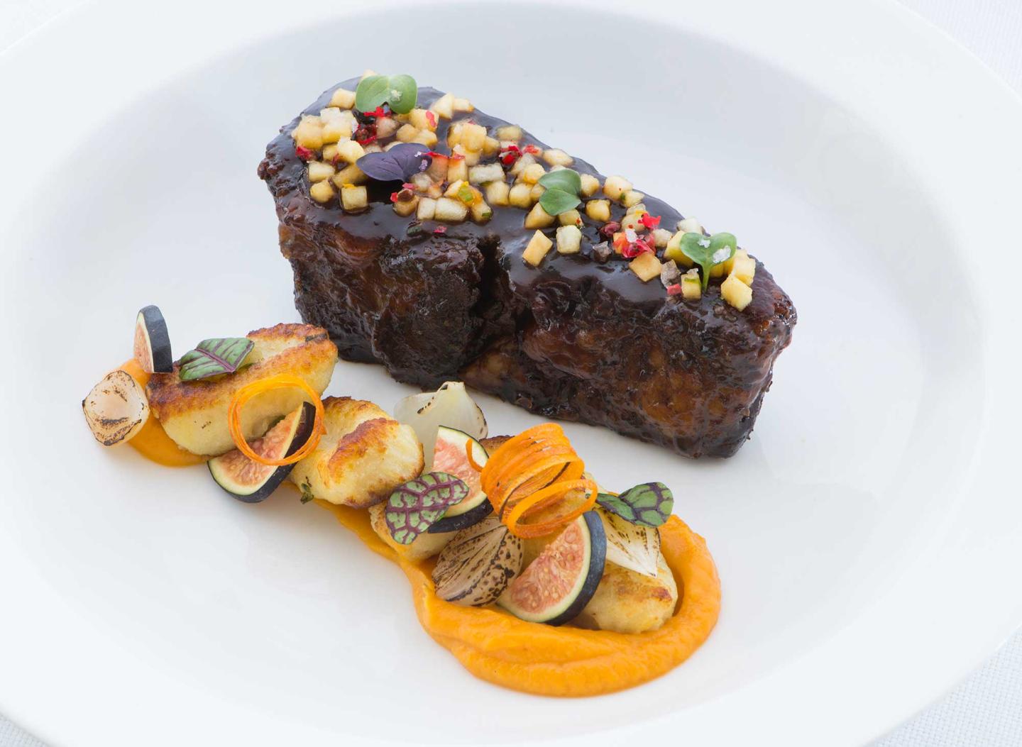 Farm to table main course plated for dinner service during reception
