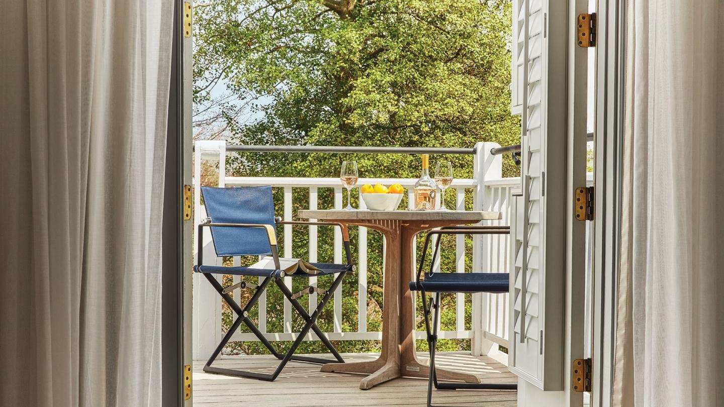 Deluxe Room - Looking out at patio furniture