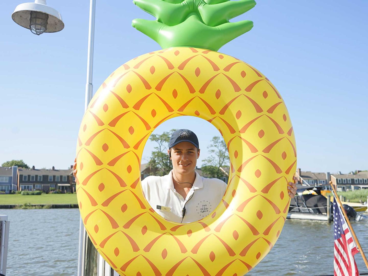 Man in inflatable pineapple