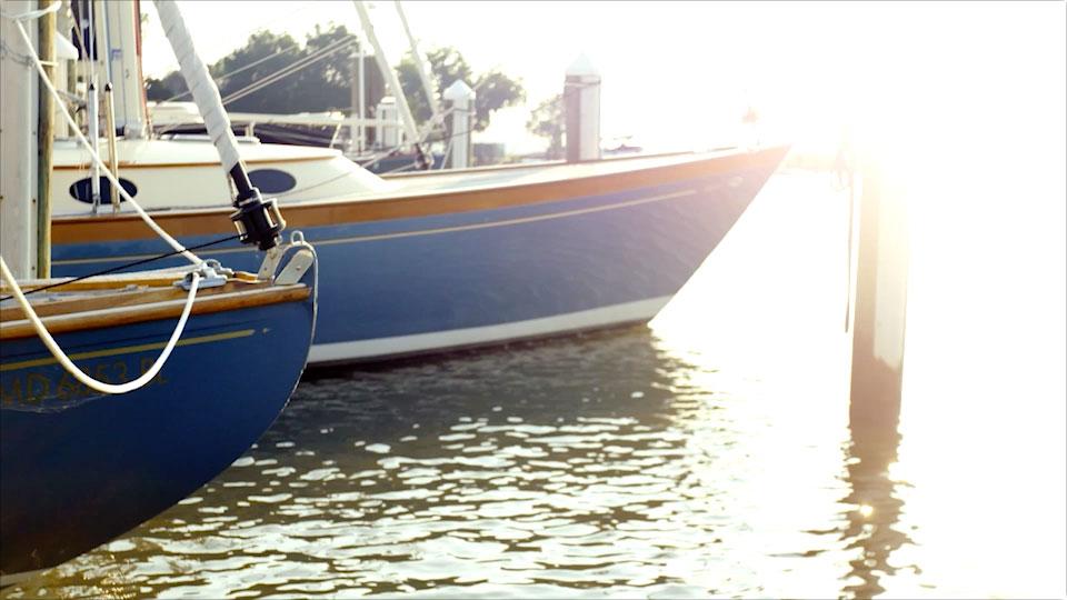 Hulls of boats in the glistening sun