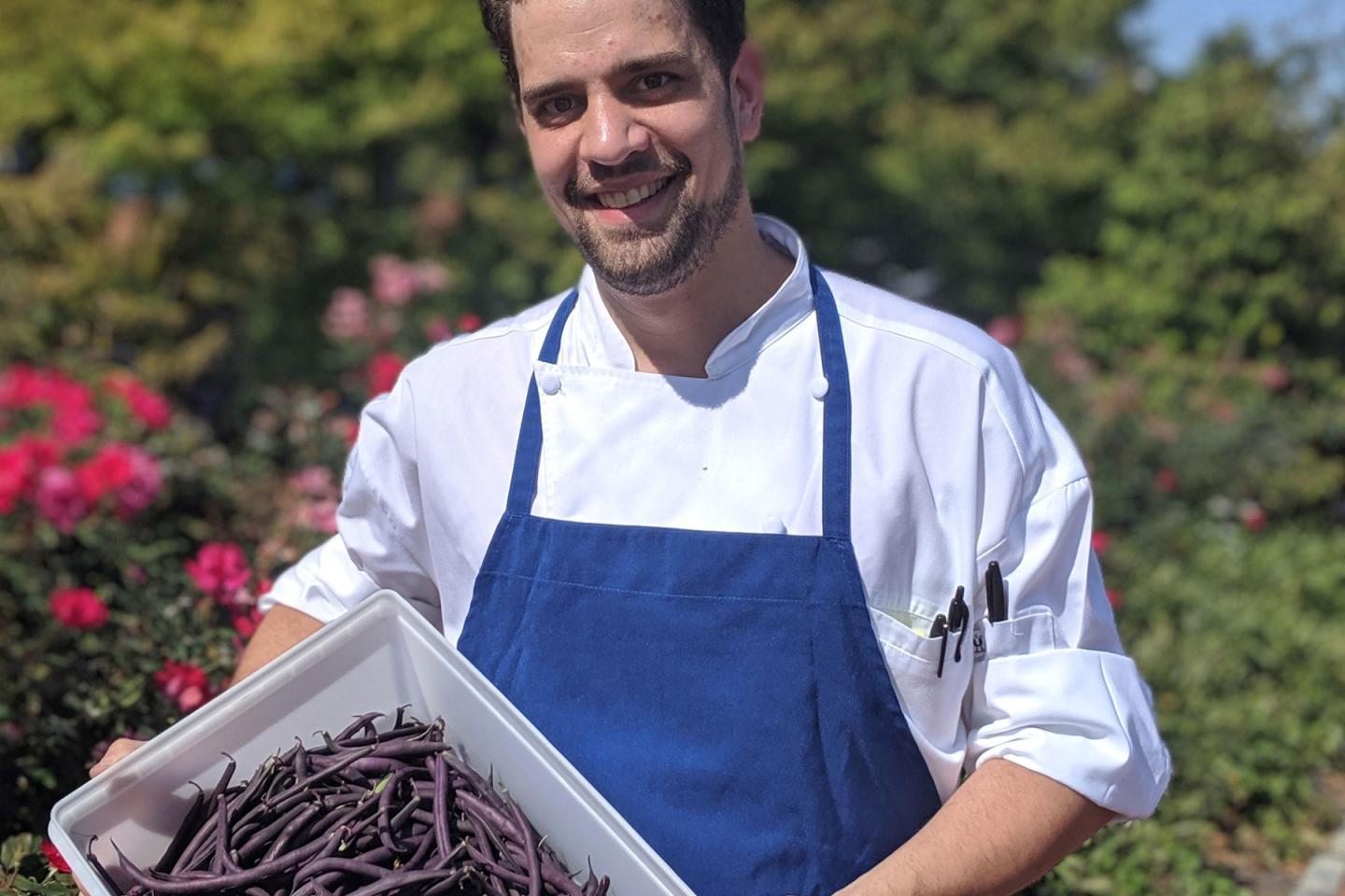 Chef holding vegatbles