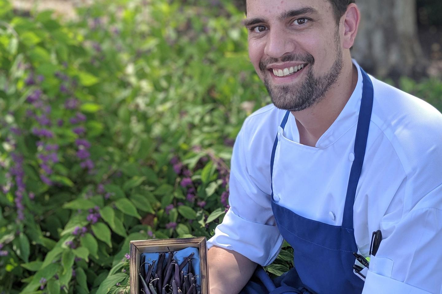 Chef holding vegatbles