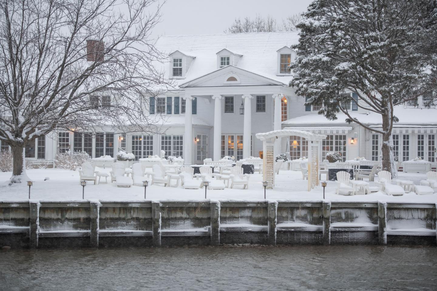 Serenity of snow glistening among the waterfront