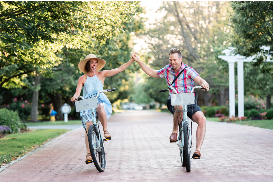 Couple riding bicycles on Linden Lane