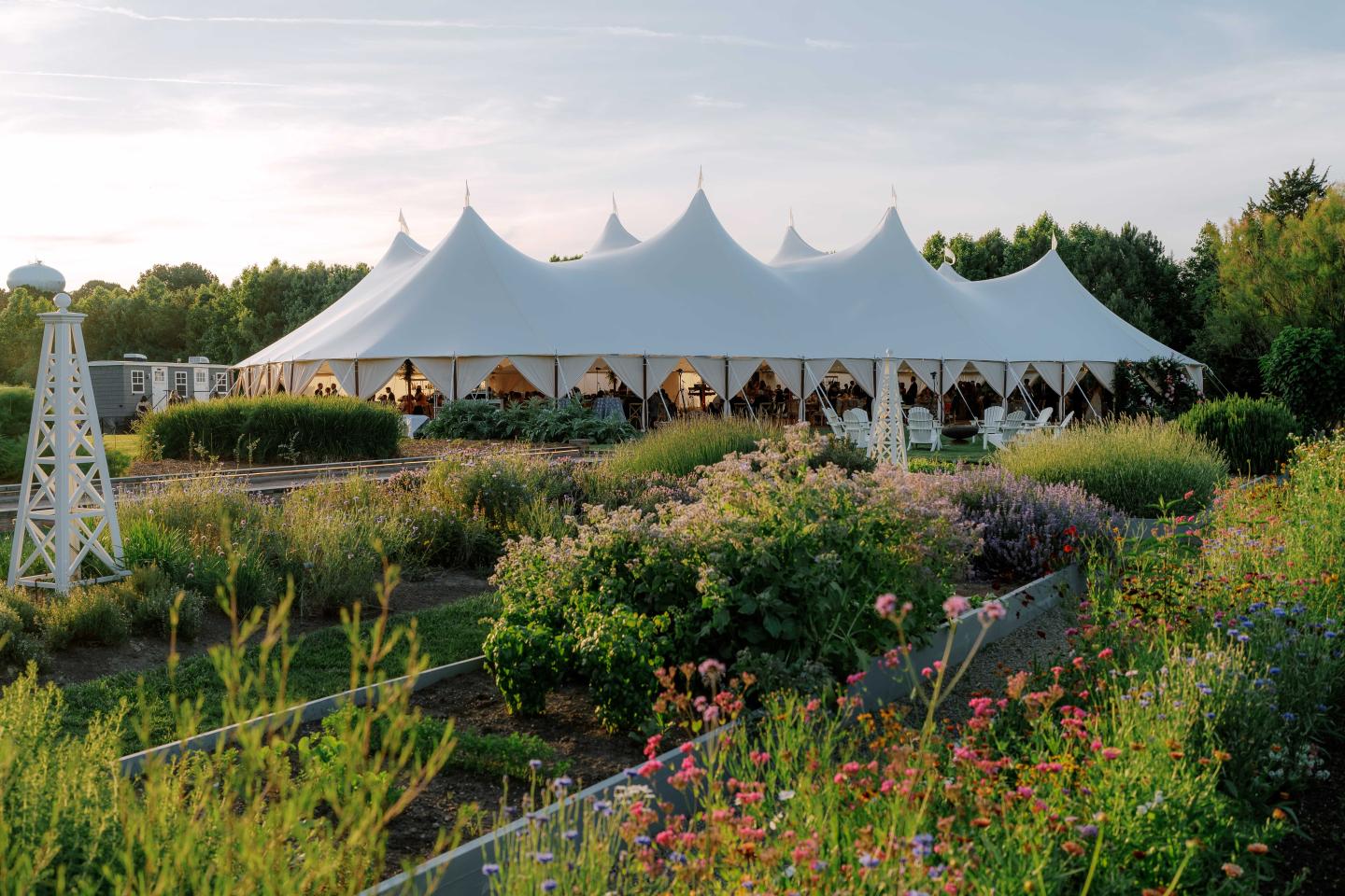 Large wedding tent set on the Linden Lawn and gardens