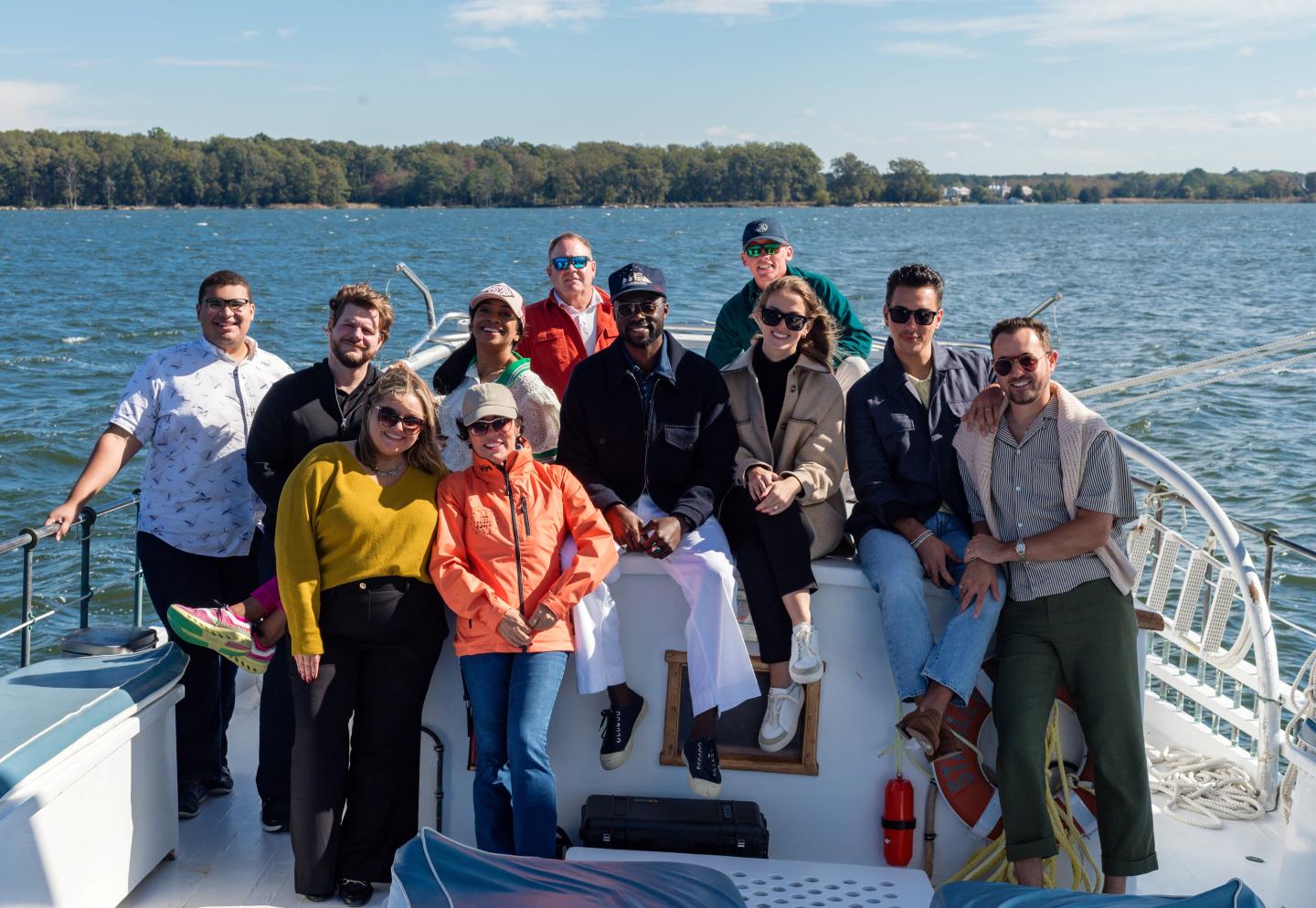 A group of people team building on the Stanley Norman Skipjack