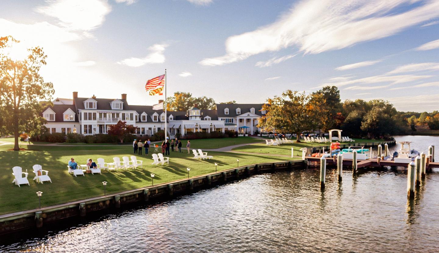 Guests gathered at the flag pole for the daily nautical toast on a fall afternoon.