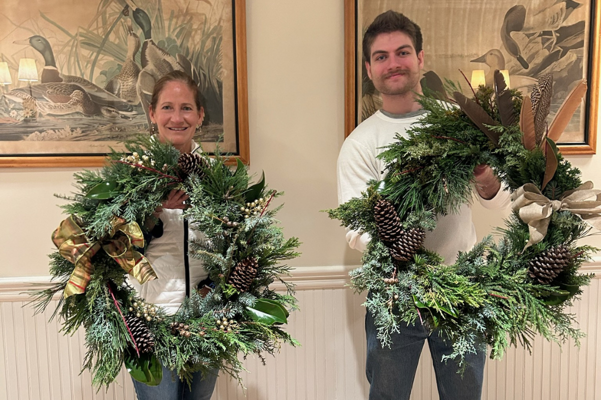 Guests with their hand made holiday wreaths